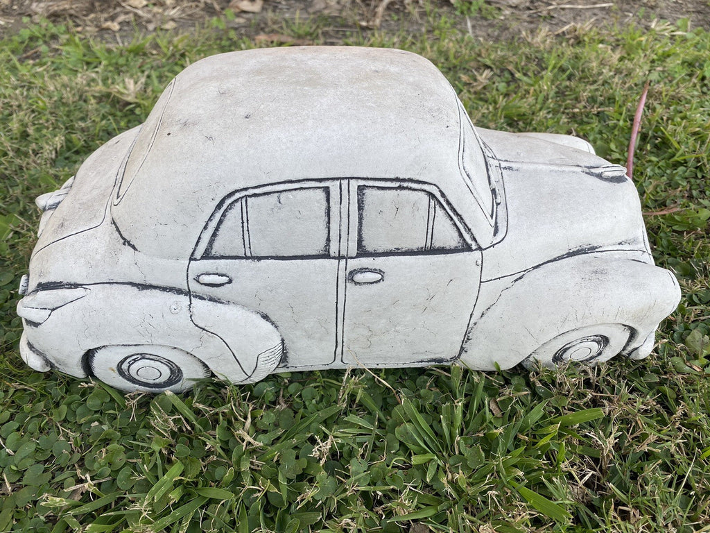 22nice4me Garden Statues 1955 FJ sedan concrete garden ornament with hand-painted details on a grassy lawn.