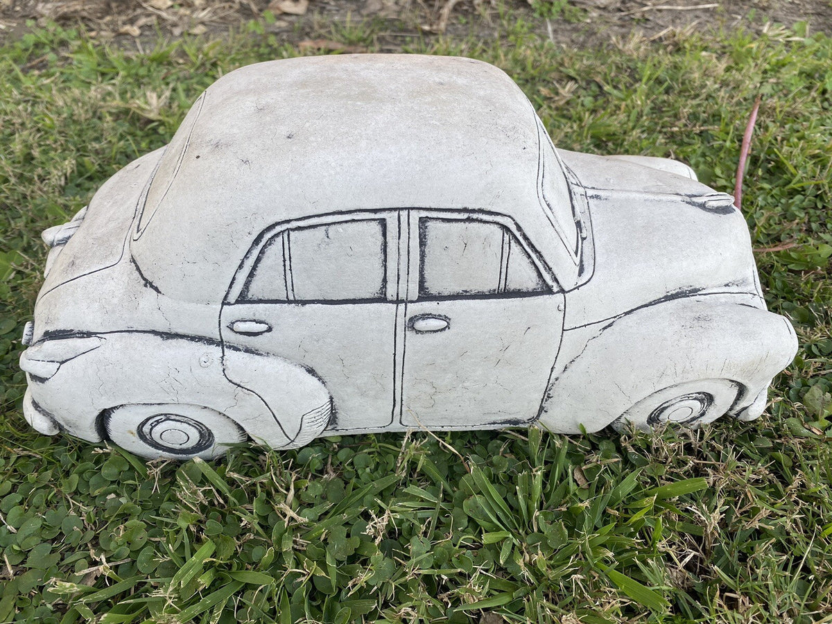 22nice4me Garden Statues 1955 FJ sedan concrete garden ornament with hand-painted details on a grassy lawn.
