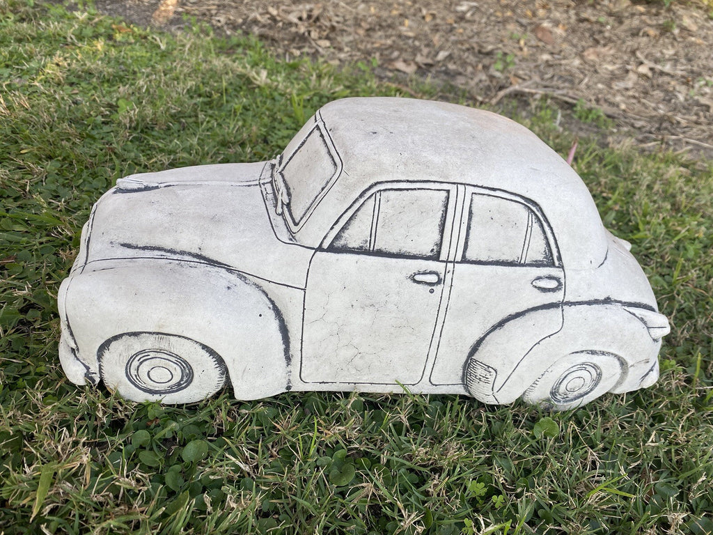 22nice4me Garden Statues 1955 FJ sedan concrete garden ornament with hand-painted details on a grassy lawn
