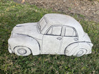 22nice4me Garden Statues 1955 FJ sedan concrete garden ornament with hand-painted details on a grassy lawn