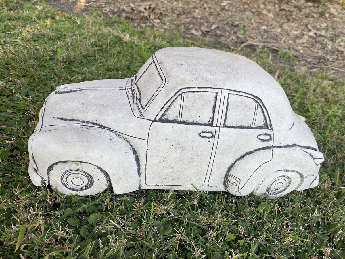 22nice4me Garden Statues 1955 FJ sedan concrete garden ornament with hand-painted details on a grassy lawn