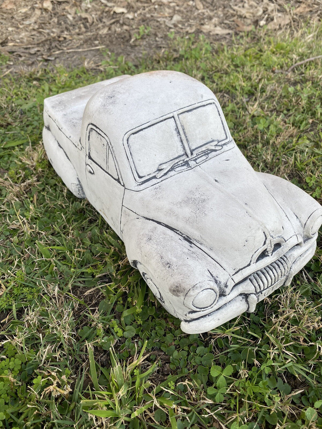 22nice4me Garden Statues 1955 FJ Ute concrete garden ornament with an antique finish, hand-painted on green grass.