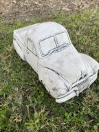 22nice4me Garden Statues 1955 FJ Ute concrete garden ornament with an antique finish, hand-painted on green grass.