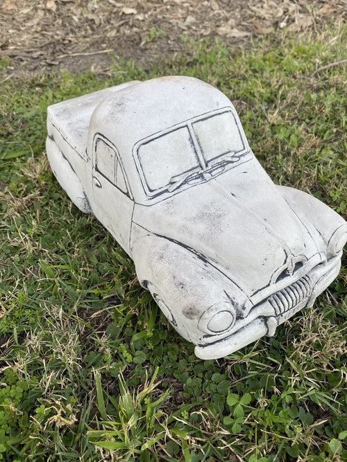22nice4me Garden Statues 1955 FJ Ute concrete garden ornament with an antique finish, hand-painted on green grass.