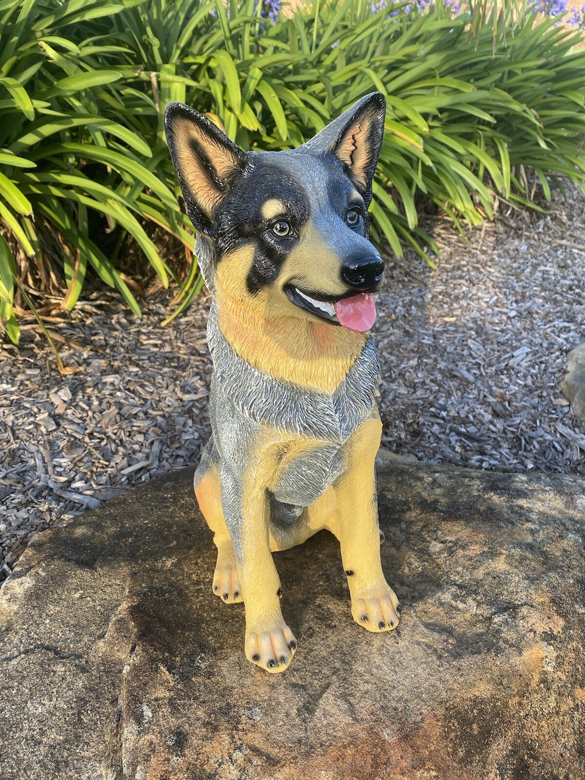 22nice4me Garden Statues hand-painted poly resin Blue Heeler dog figurine sitting on a rock in a garden setting