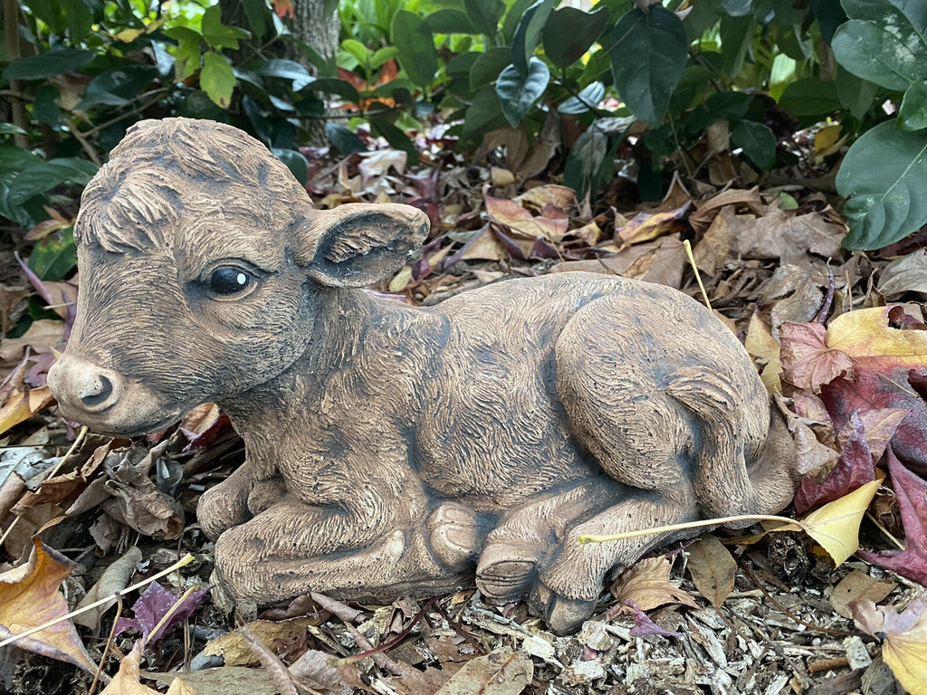 22nice4me Garden Statues brown concrete calf ornament laying down in a garden setting with a matte finish