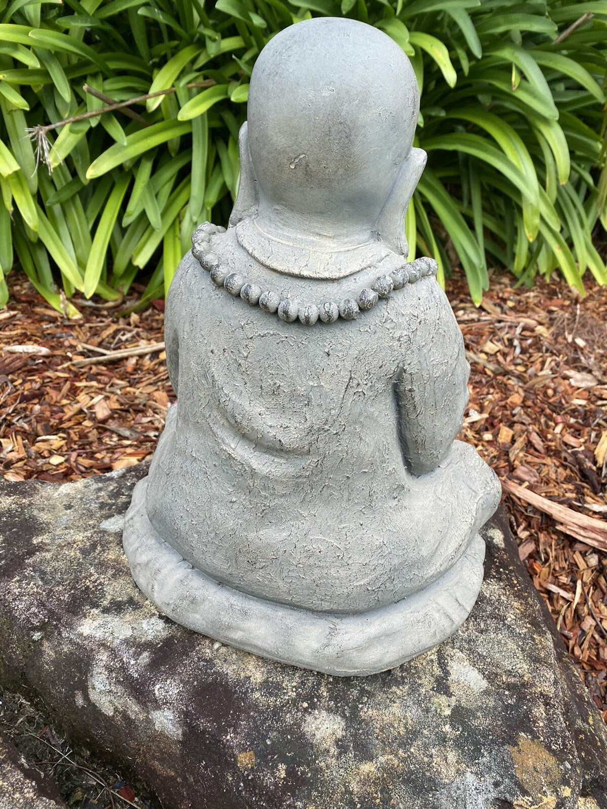 22nice4me Garden Statues Buddha figurine in grey GRC concrete with an antique finish, viewed from the back.