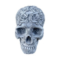 22nice4me Garden Statues concrete skull ornament with intricate Celtic knotwork carvings in a grey stone finish.