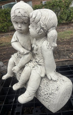22nice4me Garden Statues concrete boy and girl sitting on a log ornament with a natural stone finish