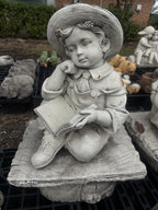 22nice4me Garden Statues concrete boy reading a book statue sitting on a rustic bench with detailed clothing