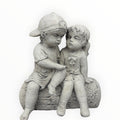 22nice4me Garden Statues concrete boy and girl sitting on a log ornament in a natural stone finish