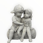 22nice4me Garden Statues concrete boy and girl sitting on a log ornament in a natural stone finish