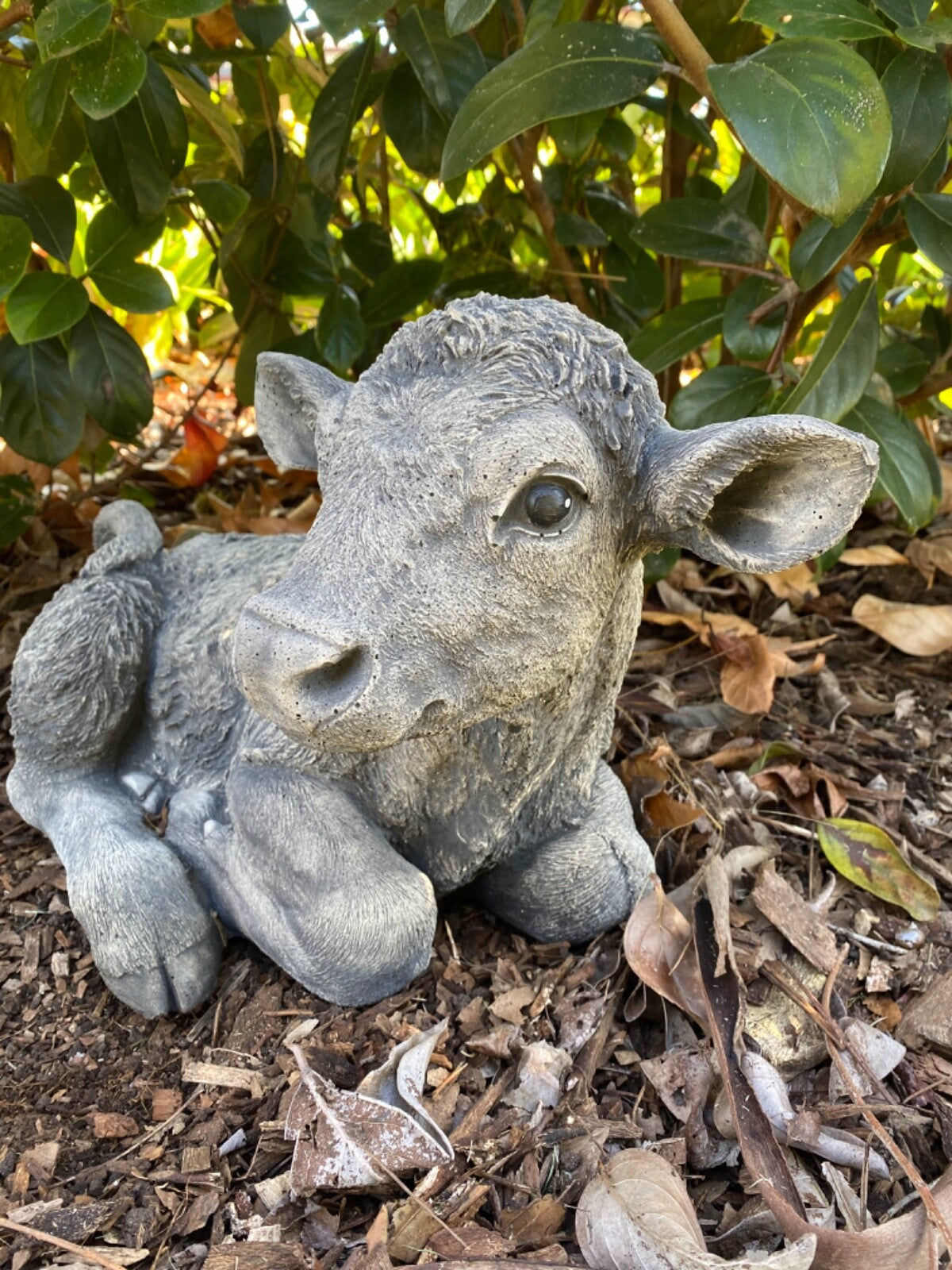 22nice4me Garden Statues concrete calf ornament with a grey matte finish resting in a garden setting