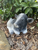 22nice4me Garden Statues hand-painted concrete Holstein Friesian cow ornament in a garden setting