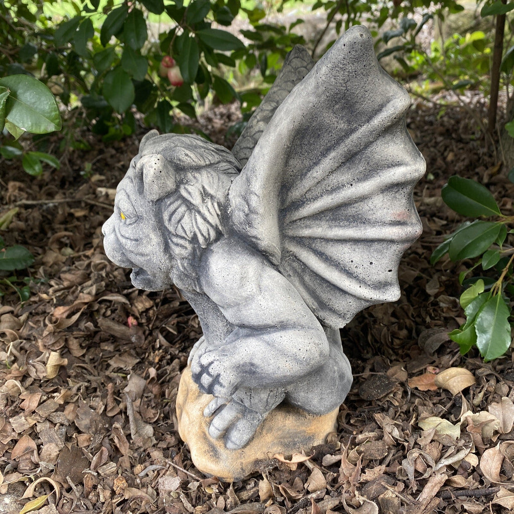 22nice4me Garden Statues hand-painted concrete gargoyle perched on a rock with a matte finish in a garden setting