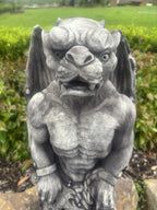 22nice4me Garden Statues concrete gargoyle garden ornament with detailed muscular features in an outdoor setting