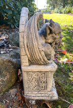 22nice4me Garden Statues concrete gargoyle sitting on an ornate throne with a matt finish in a garden setting