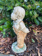 22nice4me Garden Statues hand-painted concrete girl figurine with braided hair and overalls in a garden setting