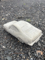 22nice4me Garden Statues concrete HK Monaro muscle car ornament with detailed bodywork on a gravel surface