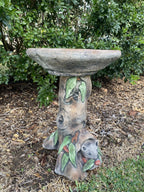 22nice4me Garden Statues concrete bird bath featuring a rustic tree pedestal with a sculpted possum and green leaves.