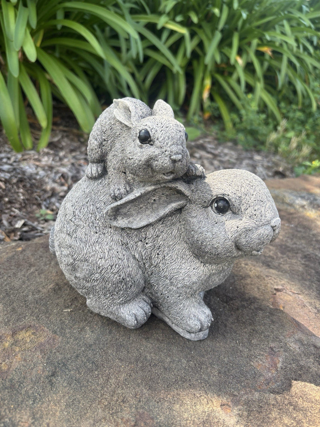 22nice4me Garden Statues concrete rabbit ornament featuring a small bunny sitting on a larger rabbit in a garden
