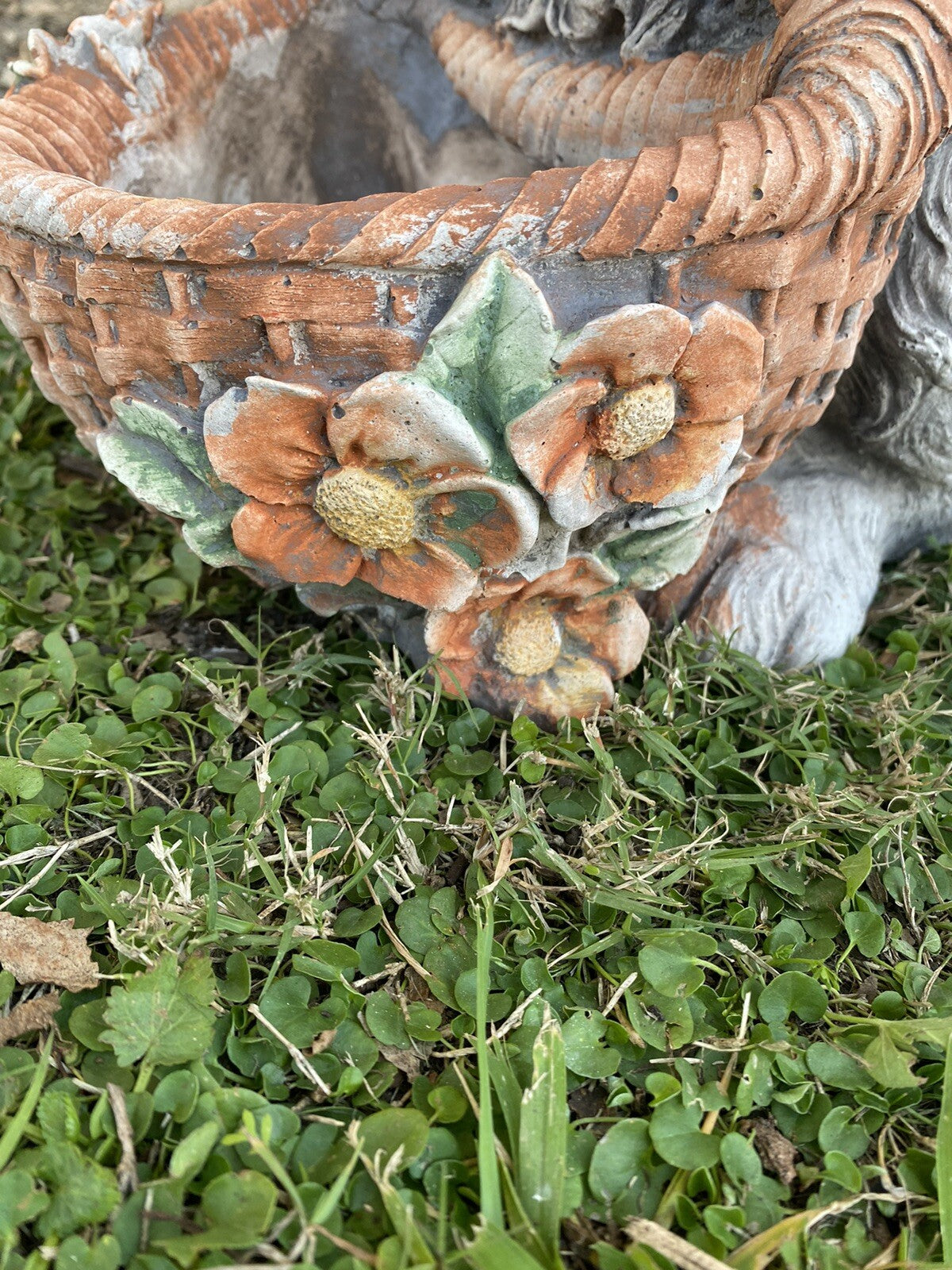 22nice4me Garden Statues concrete rabbit basket planter with hand-painted orange floral details on green grass