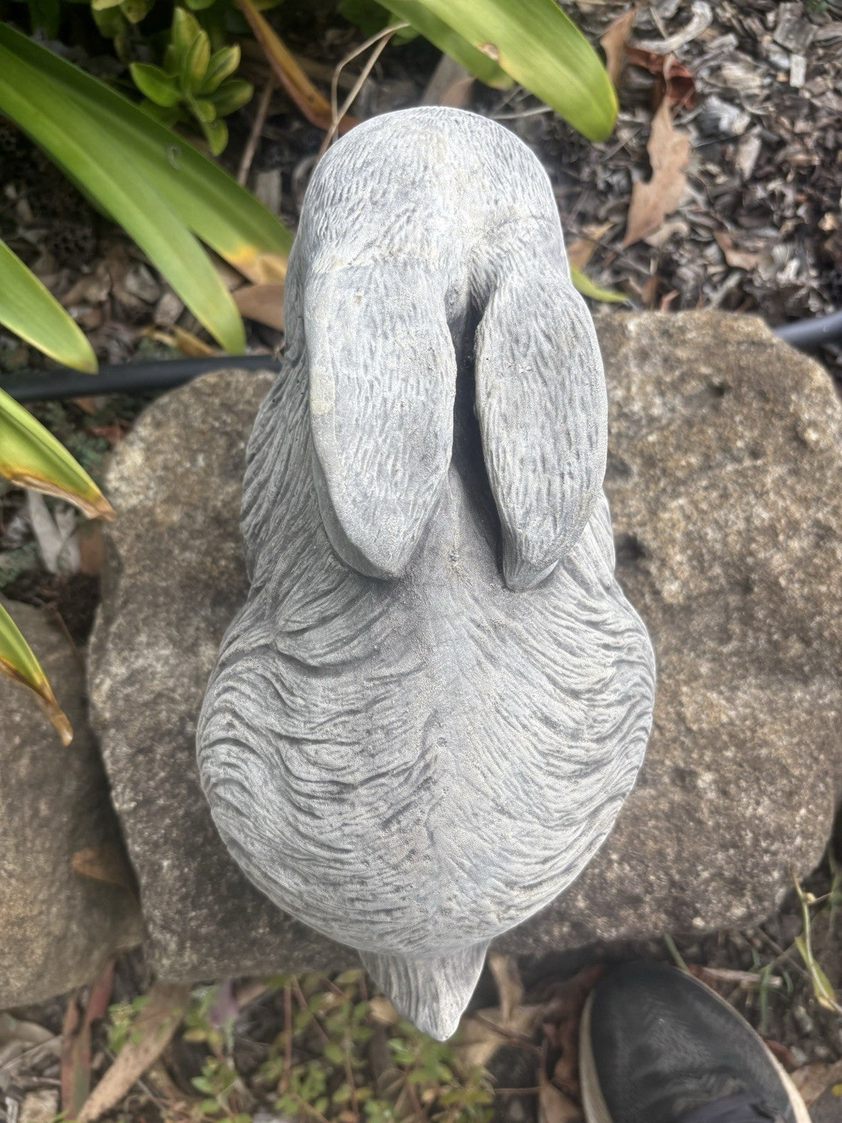 22nice4me Garden Statues concrete rabbit garden ornament with textured grey finish viewed from above