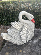 22nice4me Garden Statues white concrete swan ornament with detailed feathers and a red beak on a stone surface