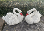 22nice4me Garden Statues pair of white concrete swan ornaments with detailed feathers and red beaks on a stone base