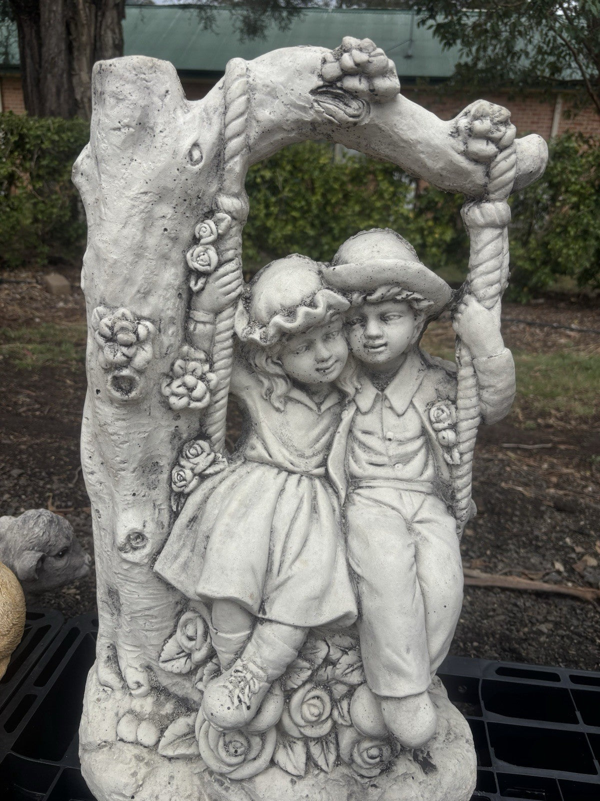 22nice4me Garden Statues concrete boy and girl on a floral swing ornament with vintage tree arch design