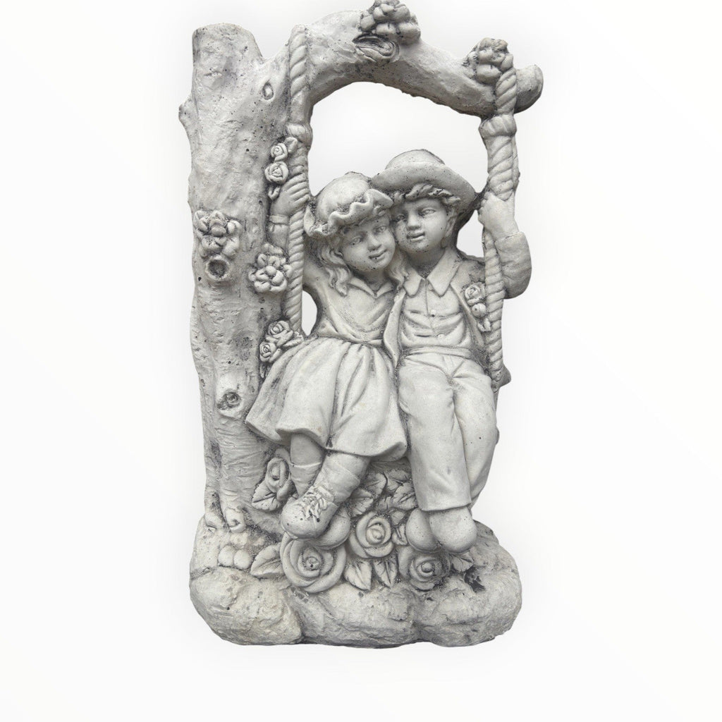22nice4me Garden Statues concrete boy and girl on a floral swing ornament with tree arch detail in natural white