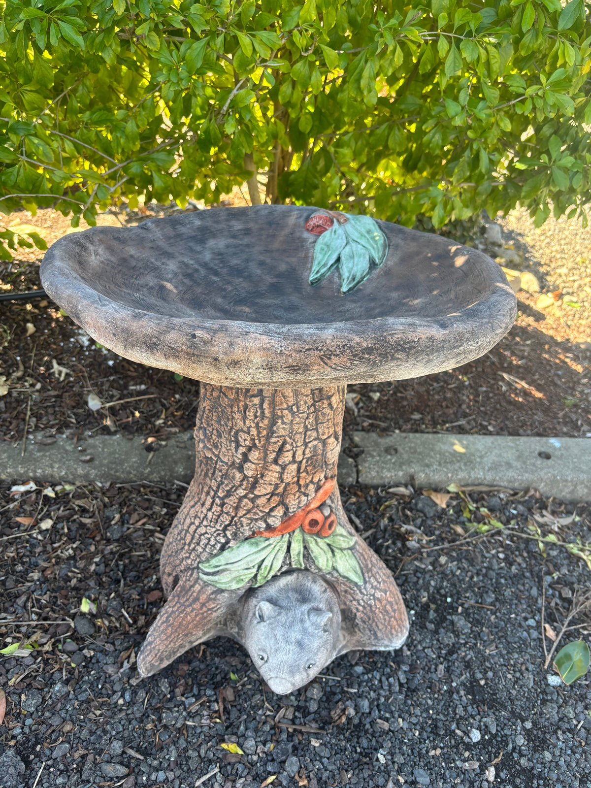 22nice4me Garden Statues concrete wombat bird bath with detailed tree trunk base and natural grey finish in a garden