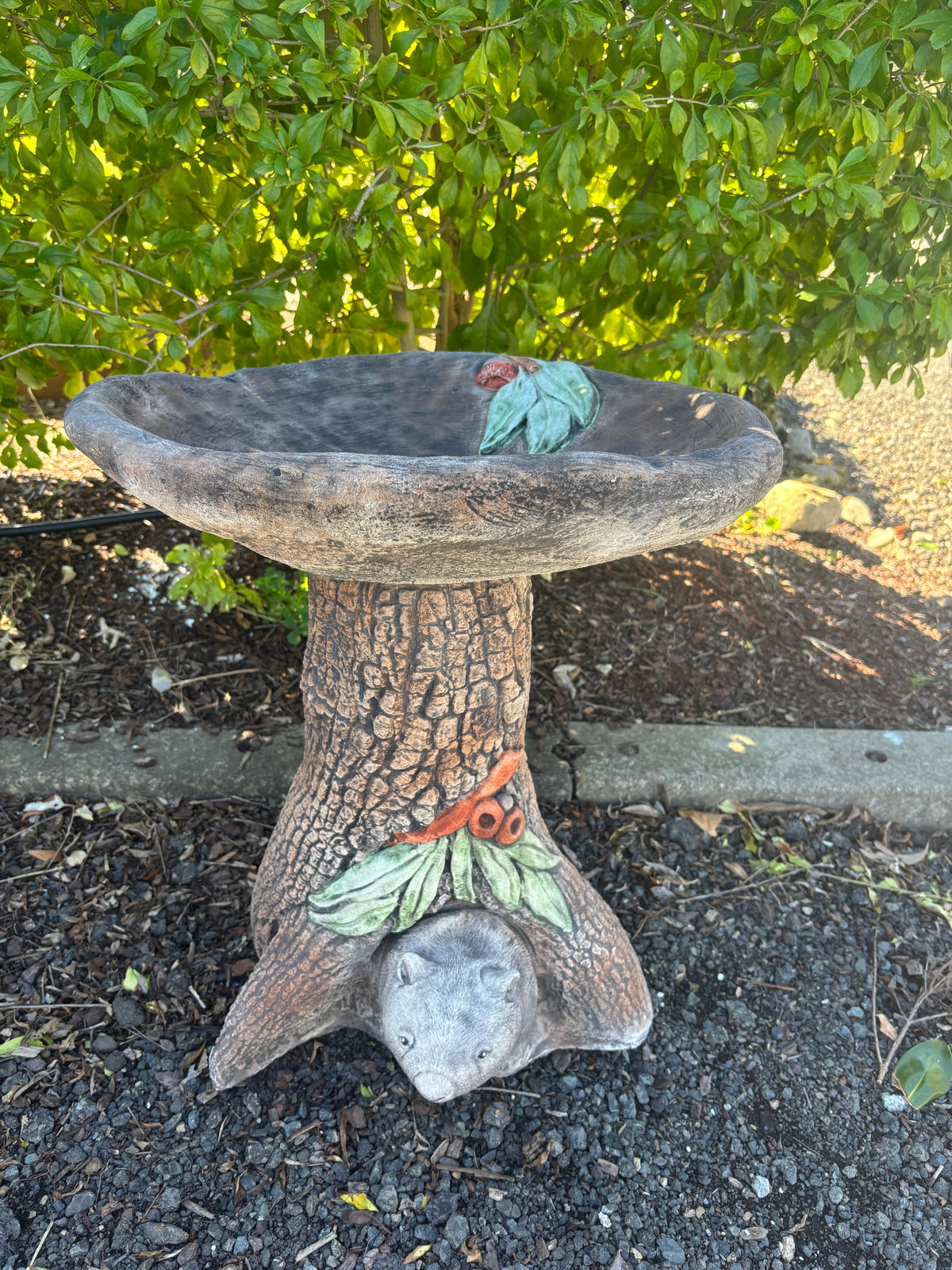 22nice4me Garden Statues Australian made concrete bird bath featuring a detailed wombat and tree trunk design.