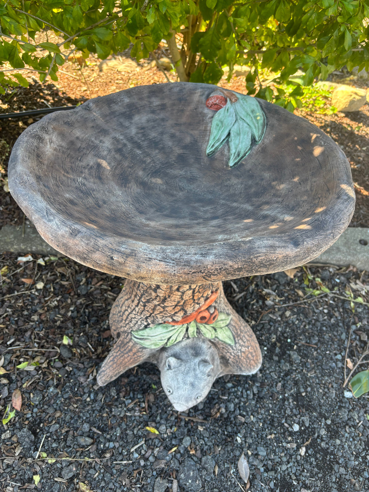 22nice4me Garden Statues concrete wombat bird bath with detailed tree trunk base and natural grey finish in a garden