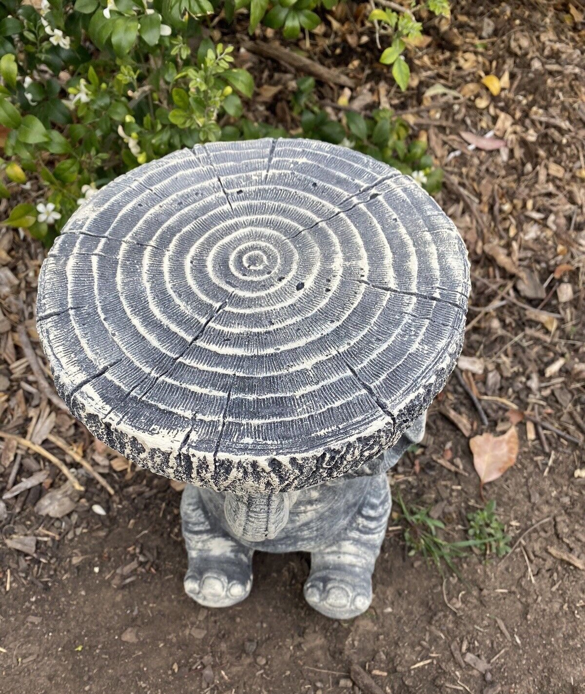 22nice4me Garden Statues elephant concrete plant stand with a realistic tree stump top in a garden setting
