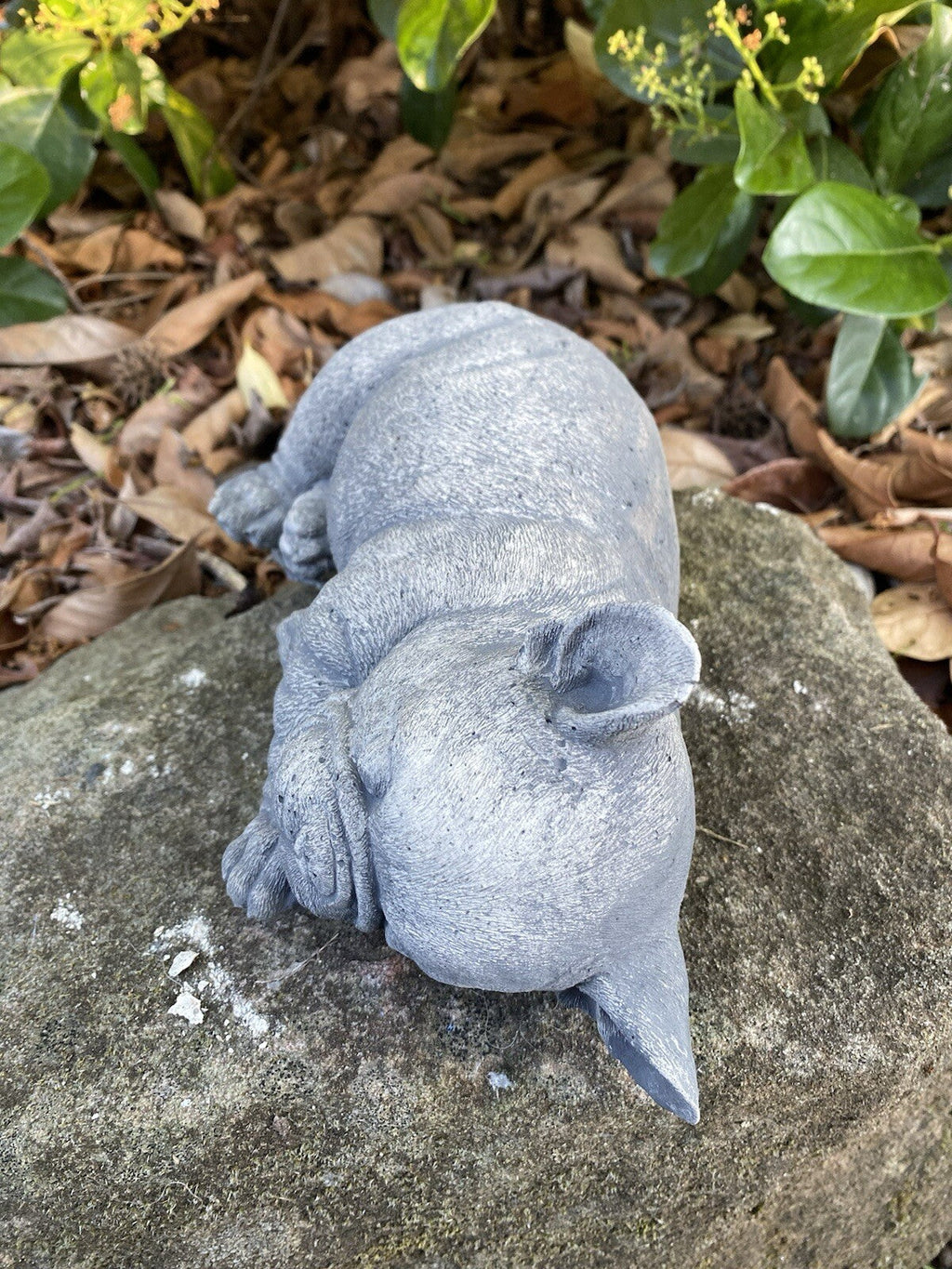 22nice4me Garden Statues French Bulldog concrete ornament resting on a stone in a garden setting