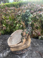 22nice4me Garden Statues resin Gaia goddess planter with green leaf crown and rustic bowl on a stone surface