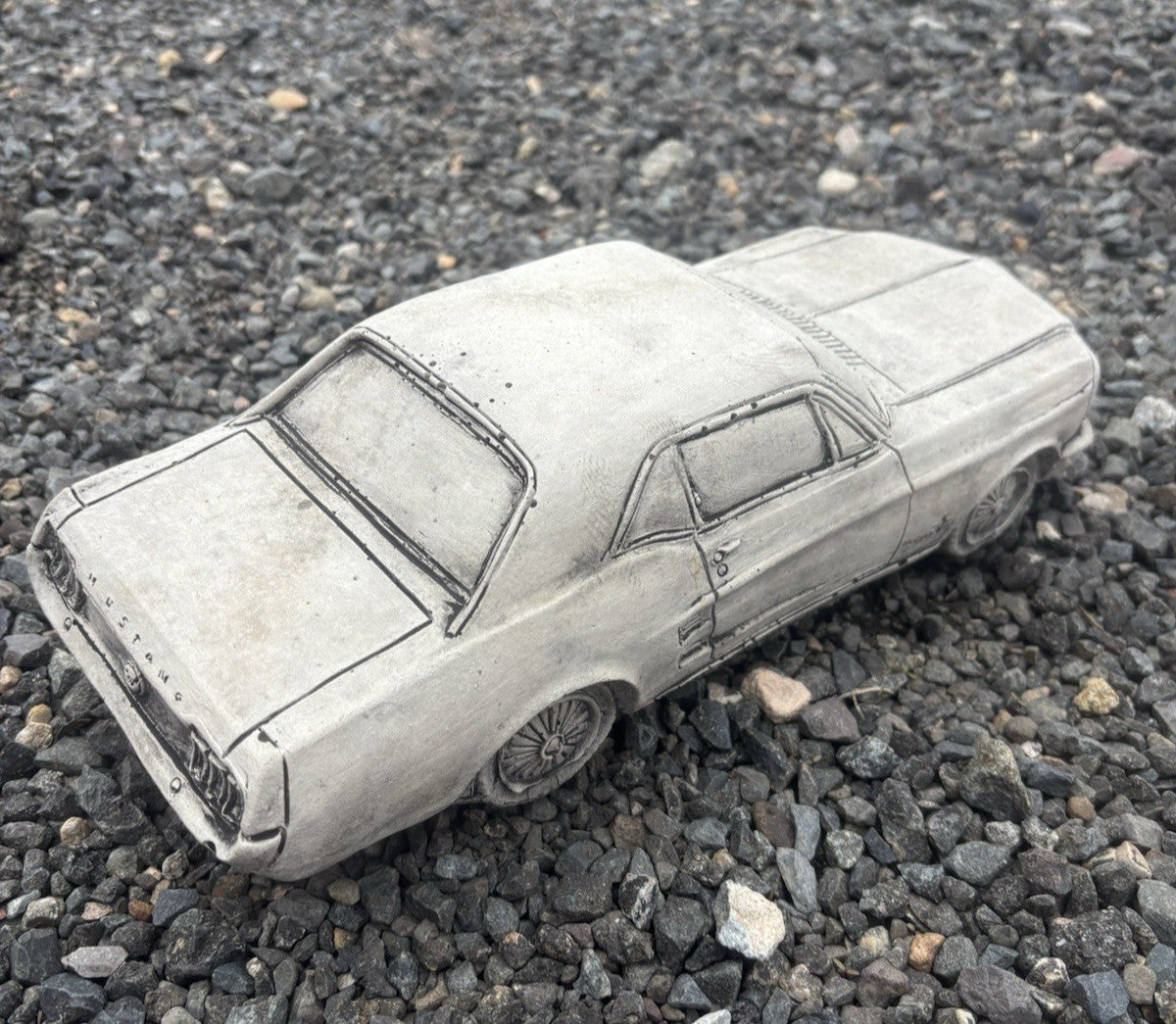 22nice4me Garden Statues 1966 Mustang concrete car ornament with detailed vintage styling on a gravel surface