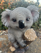 22nice4me Garden Statues resin koala ornament with textured grey fur and black nose resting on a wooden branch