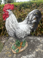 22nice4me Garden Statues resin rooster ornament with white and silver feathers, red comb, and green foliage base.