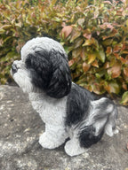 22nice4me Garden Statues resin Shih Tzu dog ornament with black and white fur, sitting on a stone surface outdoors.