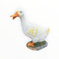 22nice4me Garden Statues white resin duck ornament with orange beak, feet, and yellow feather detailing on a base.
