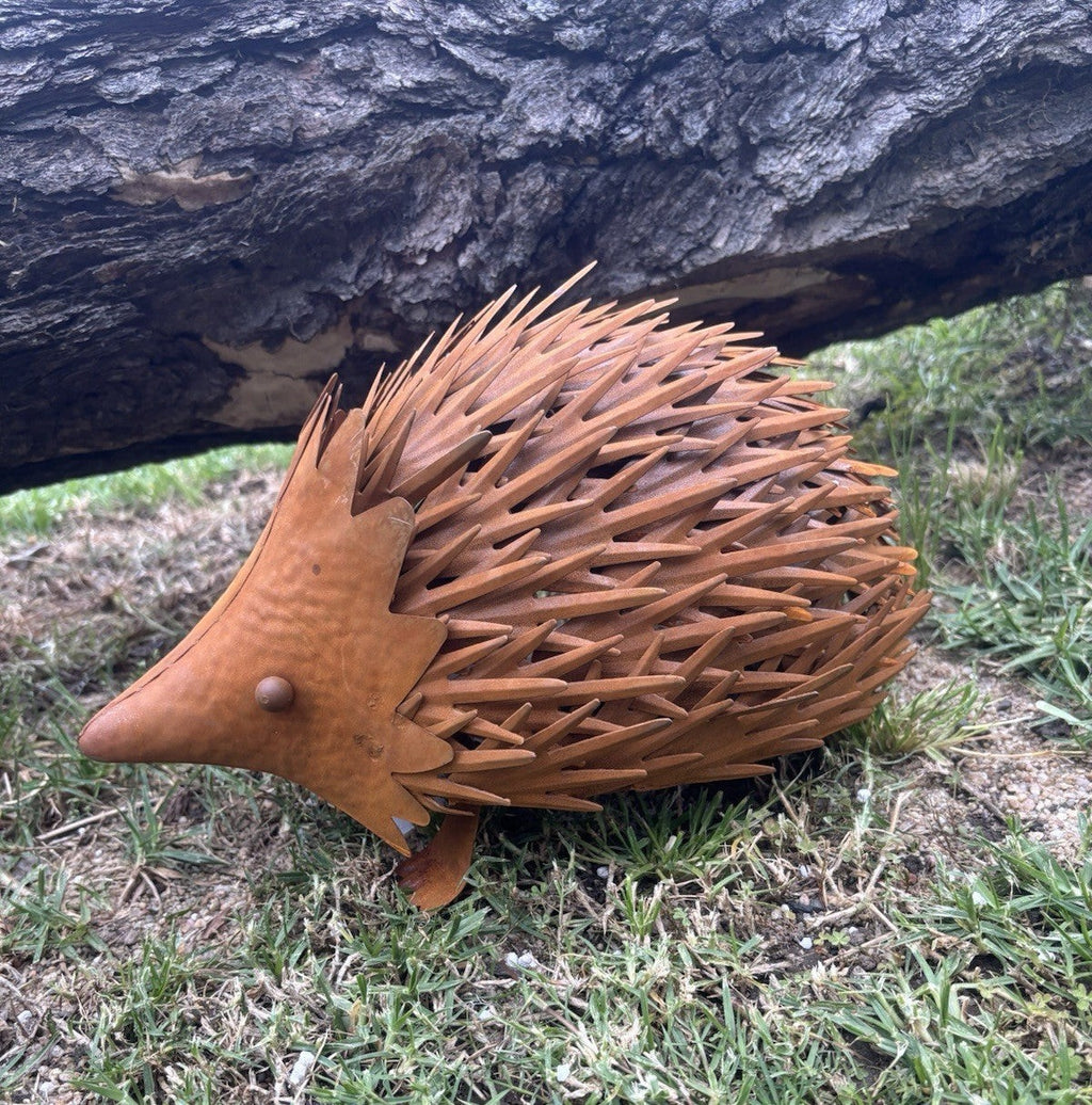 22nice4me Garden Statues handcrafted metal Australian echidna with a rustic brown finish in a garden setting