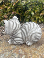 22nice4me Garden Statues sleeping grey tabby cat ornament with textured fur, shown from a side angle on a stone base.