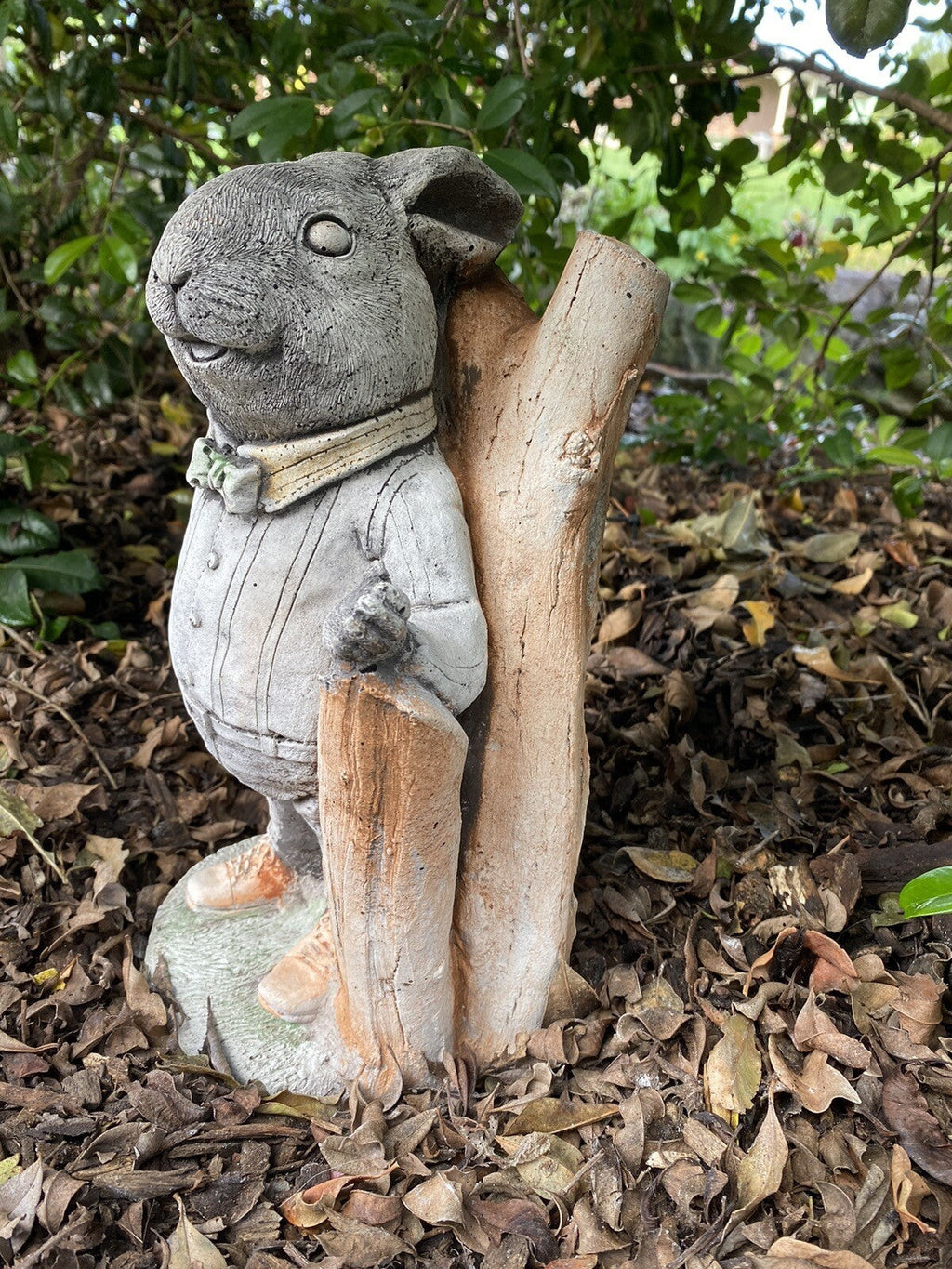 22nice4me Garden Statues Willow Father Rabbit concrete statue wearing a cardigan and pants in a garden setting