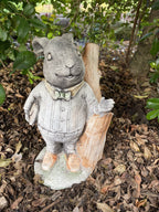 22nice4me Garden Statues Willow Father Rabbit concrete garden ornament wearing a cardigan and pants in a garden setting