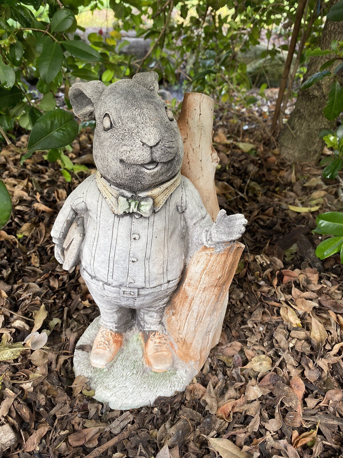 22nice4me Garden Statues Willow Father Rabbit concrete garden ornament wearing a cardigan and pants in a garden setting