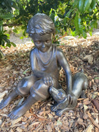 BOY SITTING WITH HIS PLAYFUL DOG  PUPPY GARDEN STATUE ORNAMENT FIGURINE
