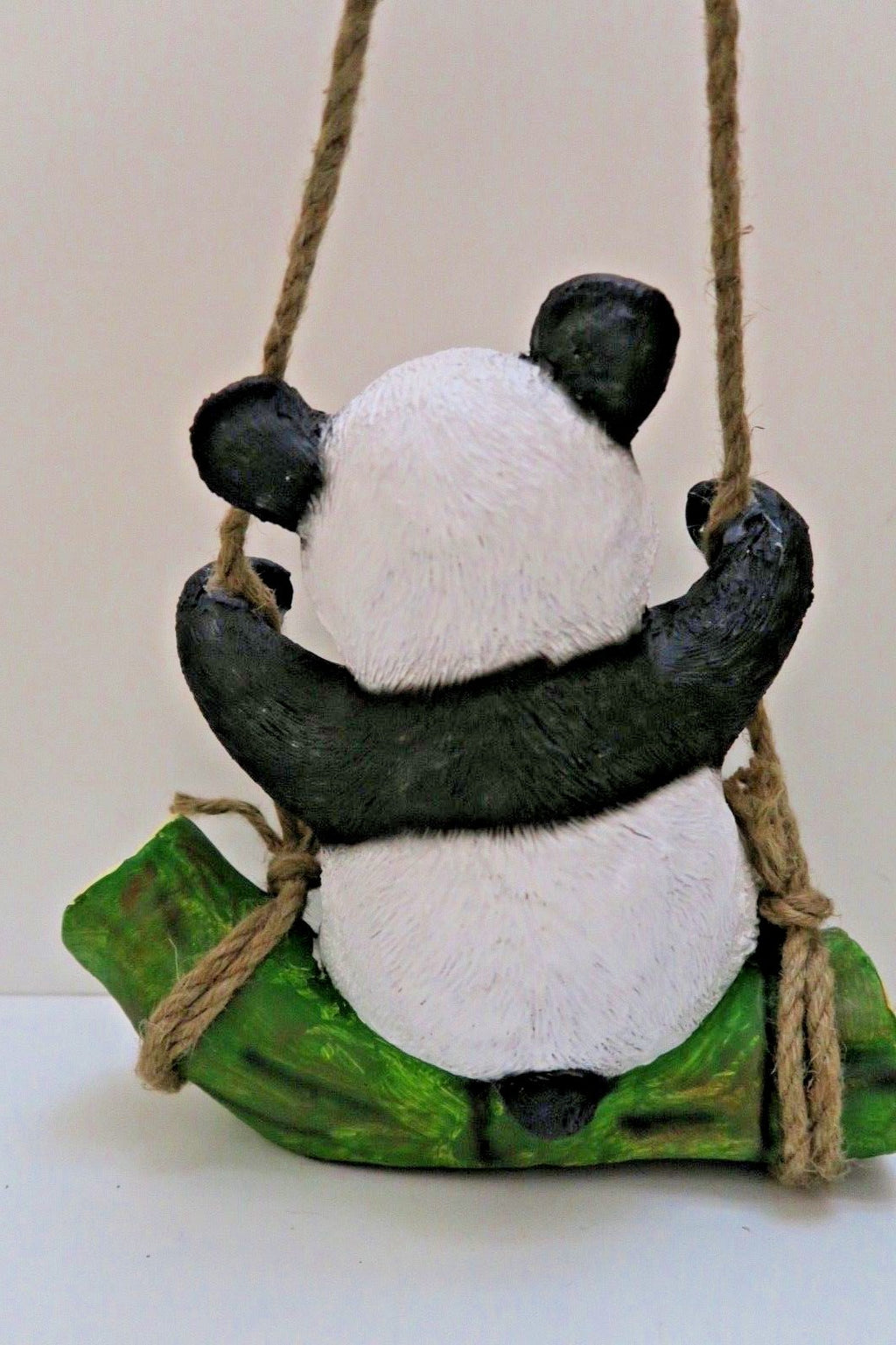 HANGING PANDA ON LOG  GARDEN STATUE
