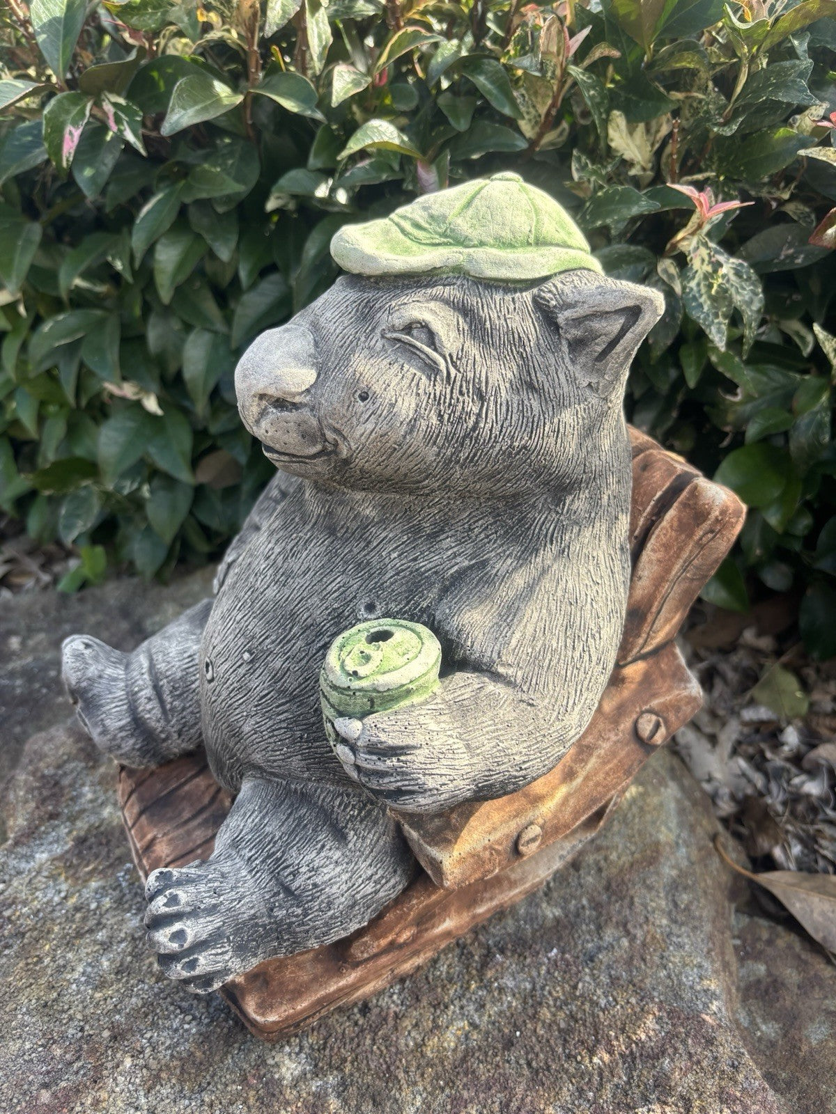 Australian Made Concrete Wombat Relaxing in Chair with a VB Garden Statue
